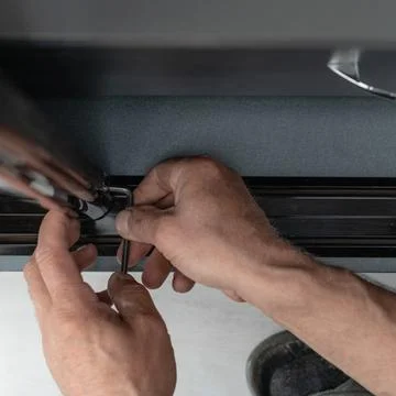 Hexagonal key for adjusting the door in the closet, installation of the cabin Foto stock