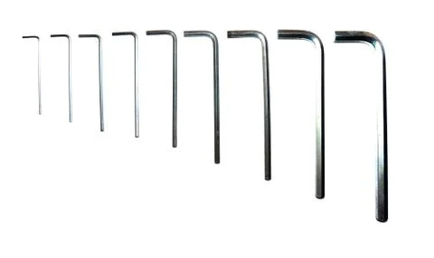 Hexagonal key on a white background. Copy space. Stock Photos