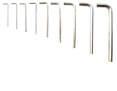 Hexagonal key on a white background. Copy space. Stock Photos