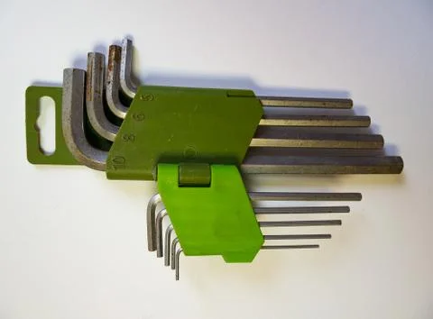 Hexagonal key on a white background. Stock Photos