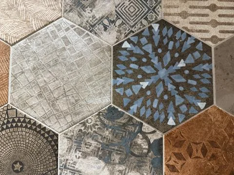 Hexagonal patterned tiles creating geometric decorative background with var.. Stock Photos
