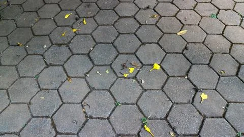 Hexagonal shape paving stone sidewalk Stock Photos