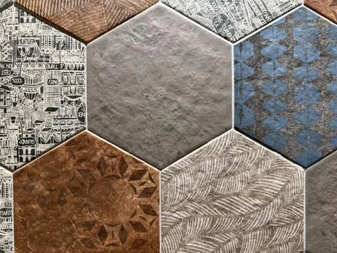Hexagonal tiles with various textures and patterns for architectural design.. Stock Photos