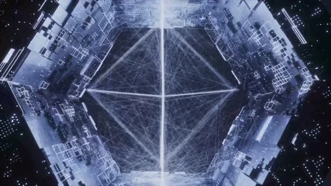 Hexagonal tunnel of tech panels with rotating wire shape Stock Footage 346780563