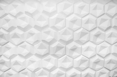Hexagonal wall texture surface. Abstract pattern background. Stock Photos