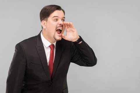 Hey some one! Worry businessman shout and fear Stock Photos