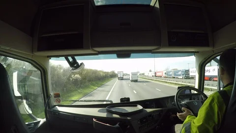 HGV (Lorry) Driving alongside heavy traffic build up at M20 J11A Video stock 111395477