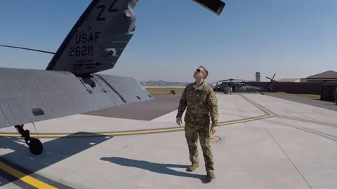 HH-60 Pave Hawk crew member conducts pre-flight walk around check Stock-Footage 108378896
