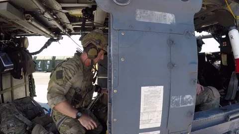 HH-60 Pave Hawk crew members prepare for flight Stock Footage 108378914