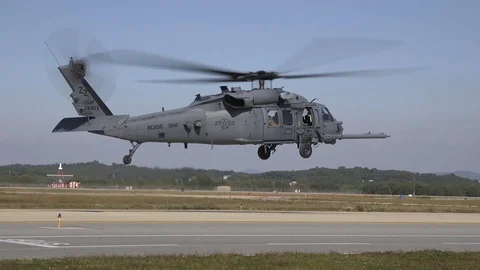HH-60 Pave Hawk helicopter hovering at Osan Air Base, South Korea Видео 108378935