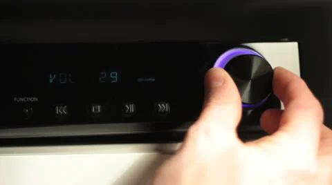 Hi-fi volume dimming with man hand Stock Footage 24779877