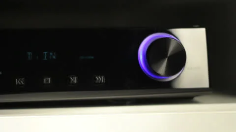 Hi-fi volume dimming with man hand Stock Footage 24779884