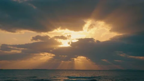 Hi Speed Cloudy on sky hide sun light through pass cloud over the ocean Stock Footage 153591464