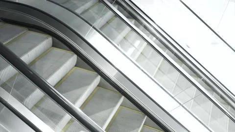 Hi Speed Escalators Down and Up in Office Building Stock Footage 153579470