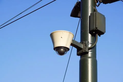 Hi-tech dome type camera and a blue sky Stock Photos
