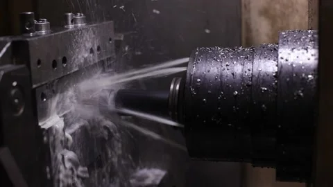 The hi-technology metal working processing by CNC turning machine Stock Footage 220698521