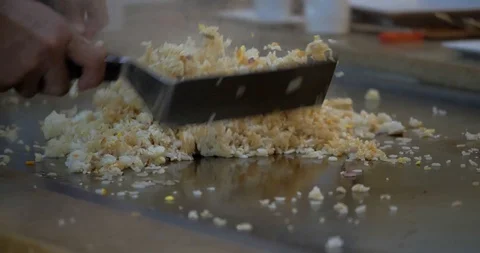 Hibachi Chef Preparing Fried Rice at Restaurant Stock Footage 103220603