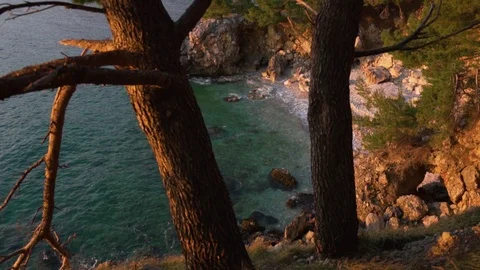 Hidden beach at sunset whith amazing clean water Stock Footage 124714501