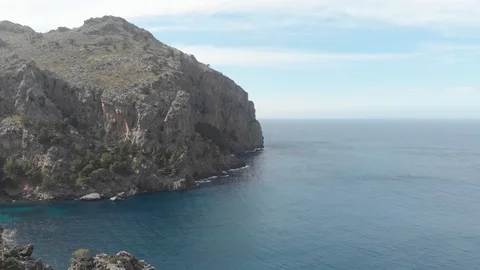 Hidden beach surrounded by mountains Video stock 126911525