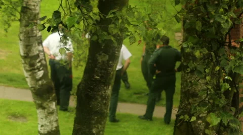 Hidden camera - group of paramedics talking - unrecognized faces. Stock Footage 40529197