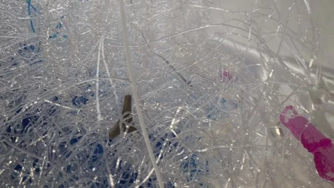 The Hidden Cost of Innovation: 3D Printer Plastic Waste Pile Stock-Footage 342758453