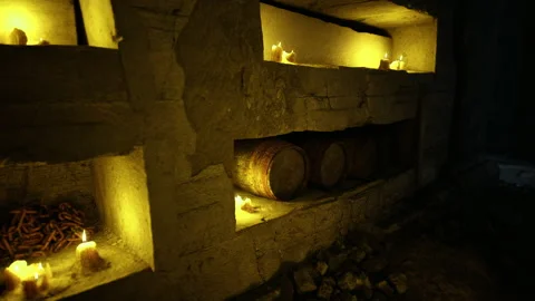 Hidden cozy bar. Candled hideaway with aged barrels and warm glow Stock Footage 341598032