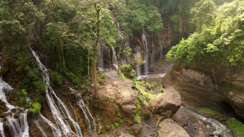 Hidden gem Waterfall with hundreds streamline in East Java Indonesia, Vídeo Stock 265135735