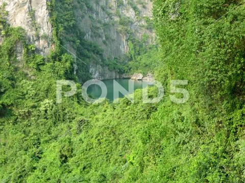 Hidden lake in between the islands of Ha Long Bay, Vietnam Stock Photos
