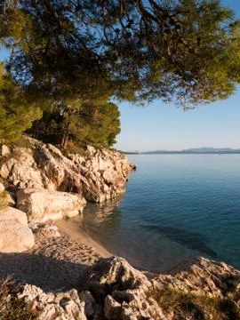 Hidden pebble beach Stock Photos