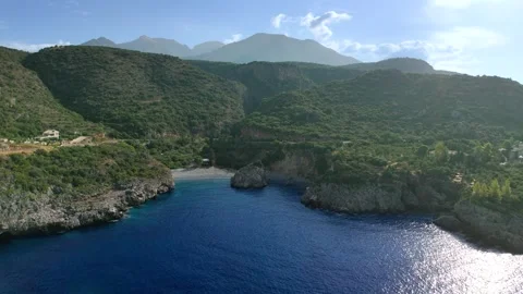 Hidden Rocky Beach and Blue Sea Near Kardamyli Stock Footage 336597943