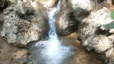 Hidden Rocky Waterfall Cascade Stock Footage 334590307