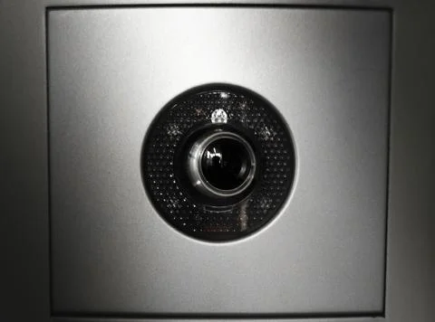 Hidden spy camera eye background Stock Photos