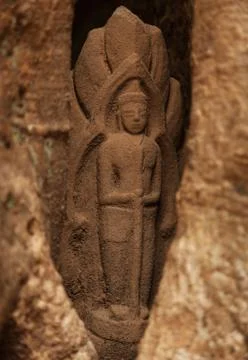 Hidden statue in Angkor temple 스톡 사진