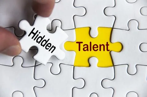 Hidden talent text on missing jigsaw puzzle. Business idea concept Stock Photos