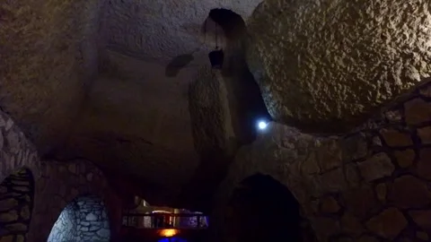 A hidden underground city carved from solid stone filled, stock footage. Stock Footage 304784741
