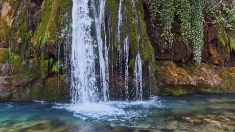 Hidden Waterfall in Lush Forest, Crystal Clear Pool and Mossy Rocks, Georgia 4K. Stock Footage 331298727