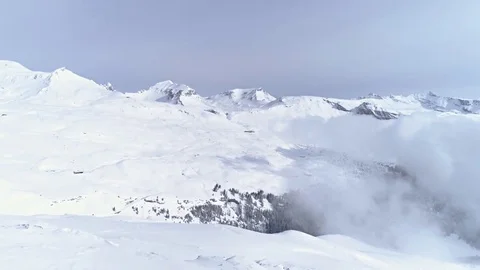 Hide Behind Rocks Mountains Winter Aerial 4k Stock Footage 77508244