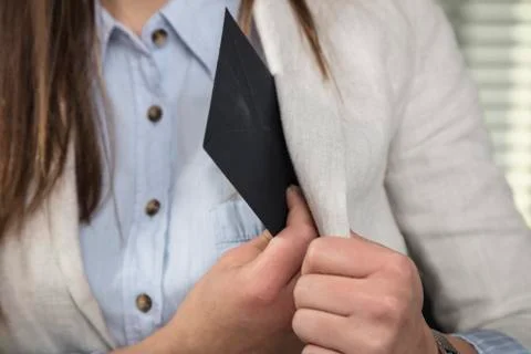 Hide the envelope under the jacke Stock Photos