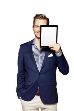 Hide the face behind digital tablet Stock Photos