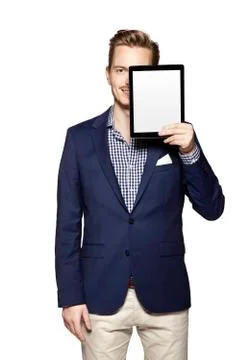 Hide the face behind digital tablet Stock Photos