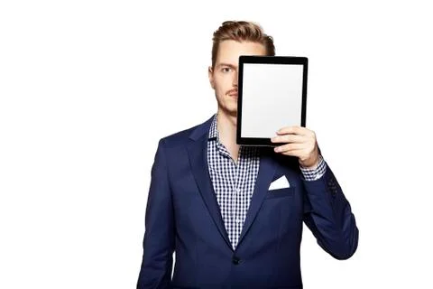 Hide the face behind digital tablet Stock Photos