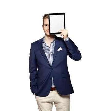 Hide the face behind digital tablet Stock Photos