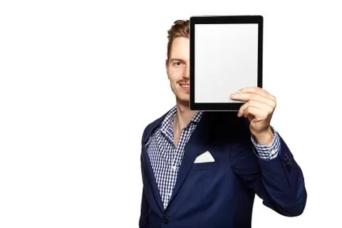 Hide the face behind digital tablet Stock Photos