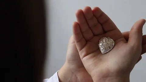 Hide a little heart Stock Footage 123490122