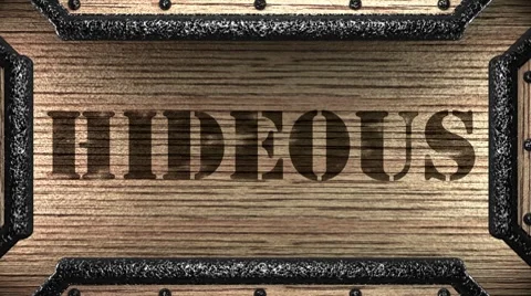 Hideous on wooden stamp Stock Footage 8653706