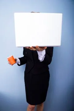 Hiding behind work Stock Photos