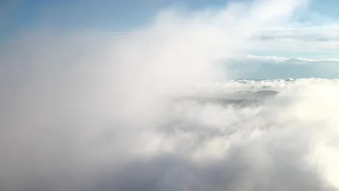 Hiding in clouds hight above in the sky drone shot Inspire2 4k Stock Footage 252498652