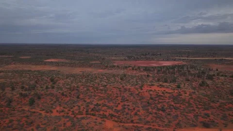 High 360-Degree Drone View Over Roxby Downs Desert Under Storm Clouds Stock Footage 311086258
