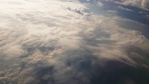 High Above Clouds. Heavenly View of Shapes Under Sunlight Vídeos de archivo 132849142