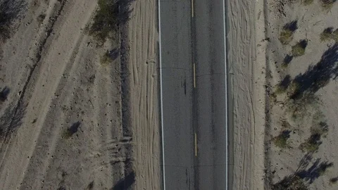 High above the desert Black luxury car Stock Footage 106969123
